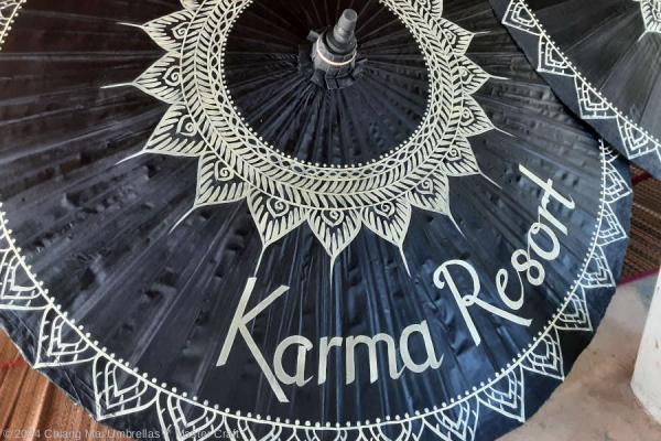 Custom promotional umbrellas - Karma Resort - Hand painted logo